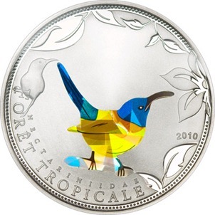 Monedas de pájaros prismáticos